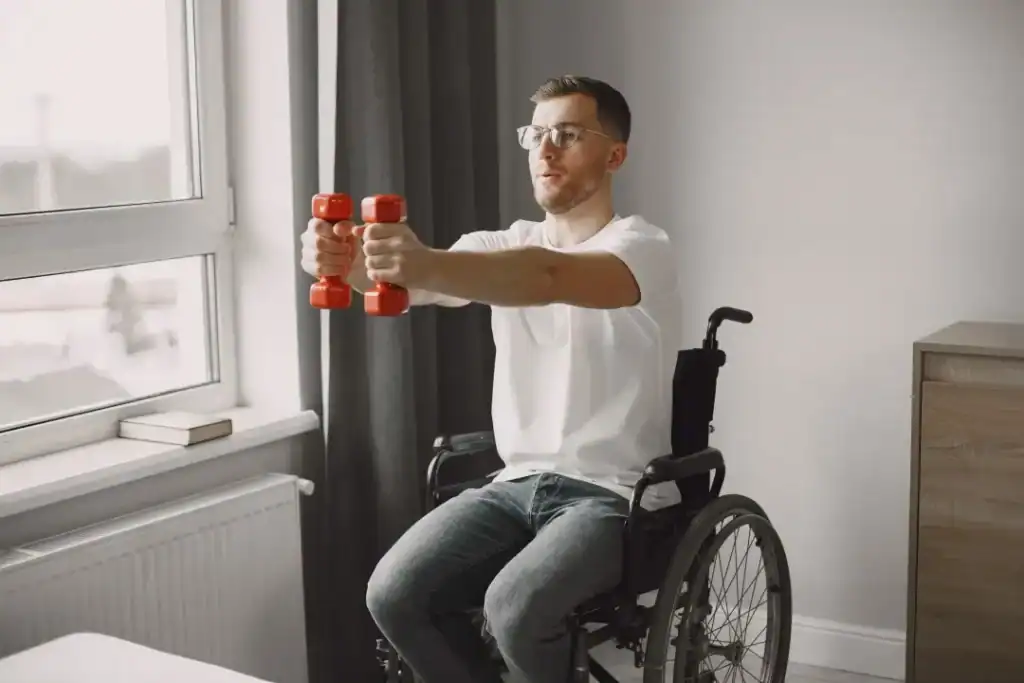 Image of man doing exercise in his wheelchair to aid weight loss Ruislip