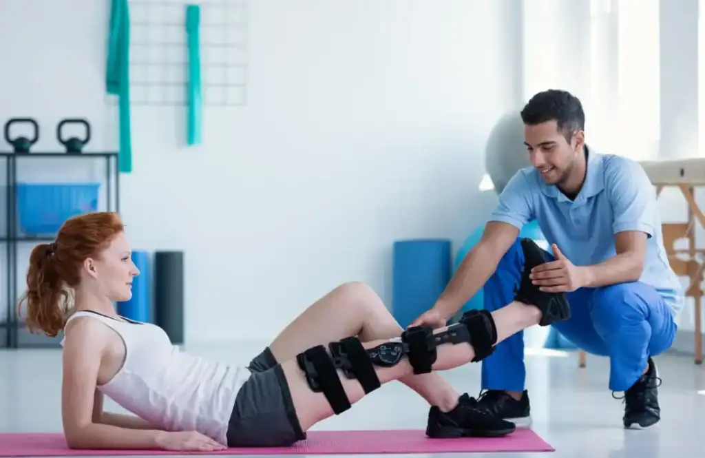 Debunking Meal Timing Myths: The Truth About Muscle Recovery 1 Woman having treatment to help muscle recovery Ruislip after an injury